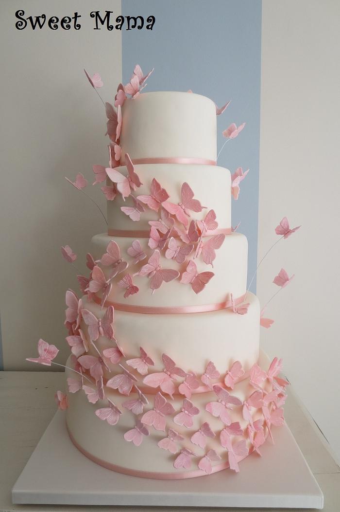 Pink butterflies wedding cake