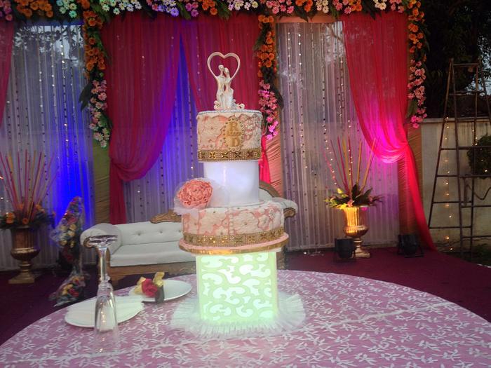 Wedding cake with lantern lighting 