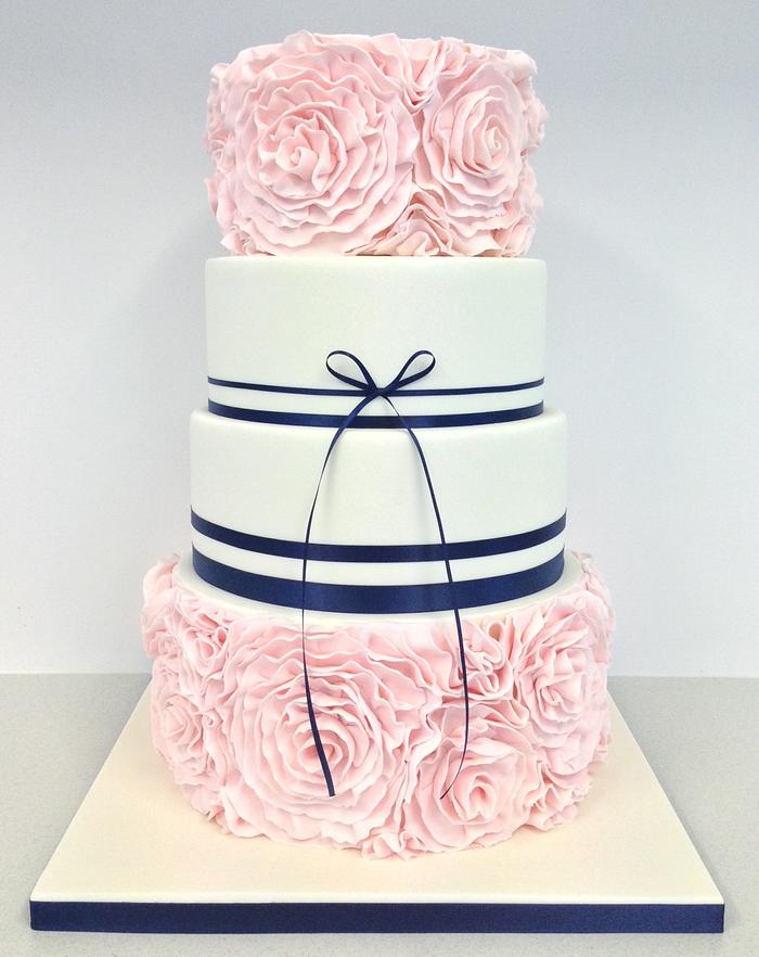 Pretty pink and navy ruffle Rose cake 