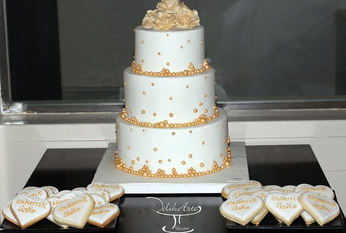 Gold and white wedding cakes