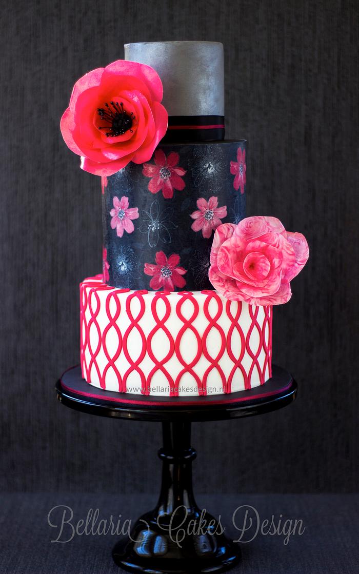Sweet sixteen birthday cake with bright pink wafer paper flowers
