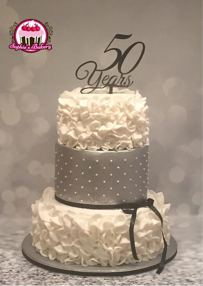 White and silver 50th birthday cake