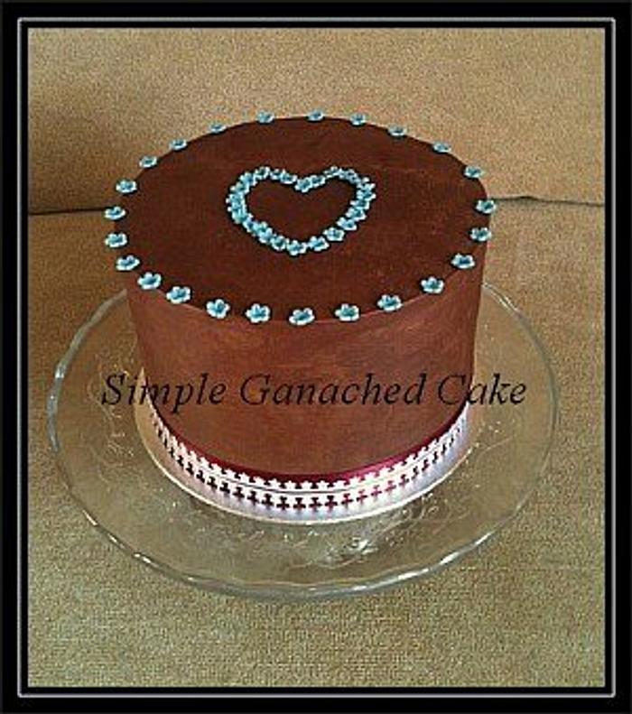 simply decorated gancache cake