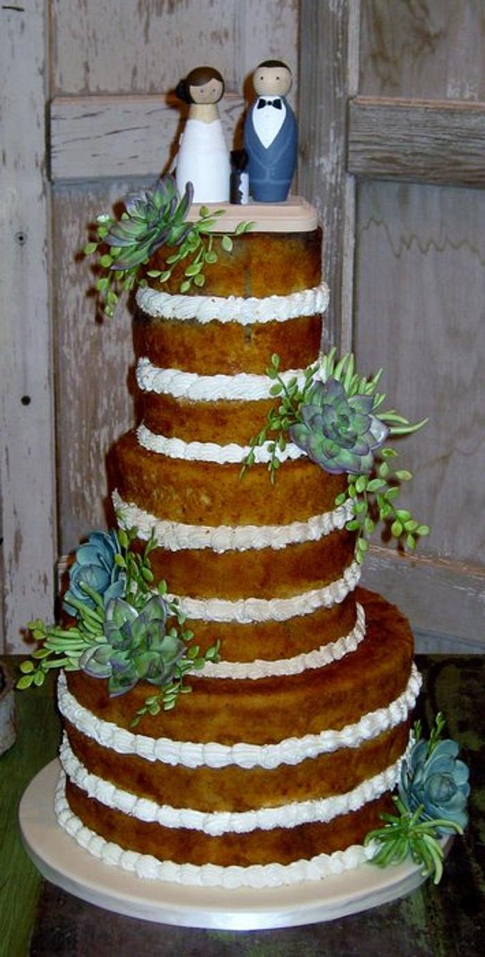 Unfrosted succulent wedding cake