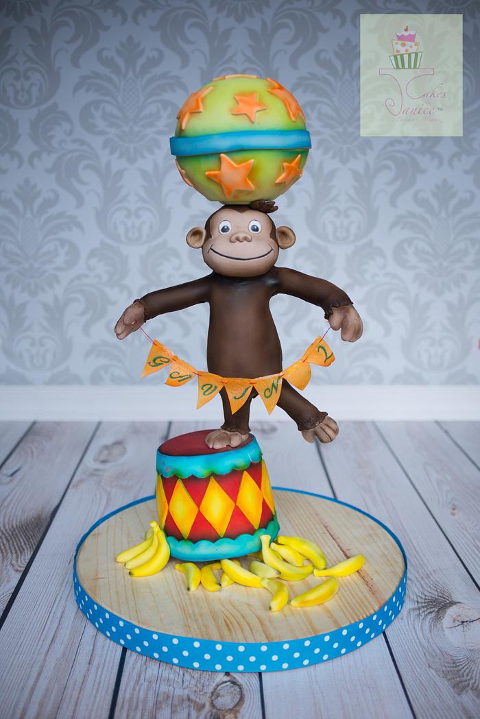 Curious George cake circus balance cake