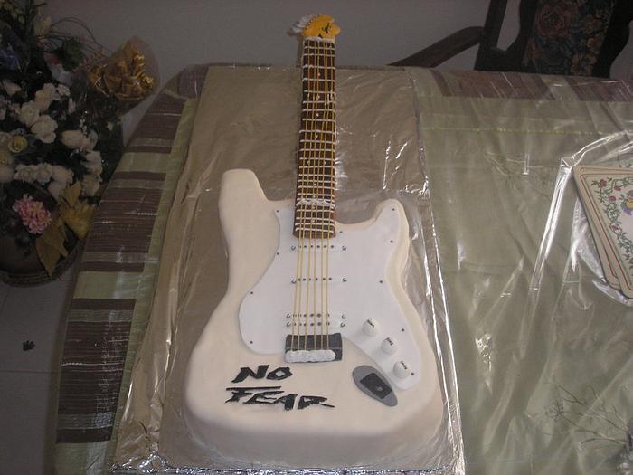 electric guitar cake and coach bag and shoe cake