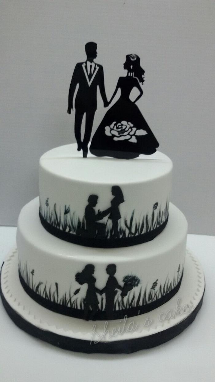 Black and white engagement  cake
