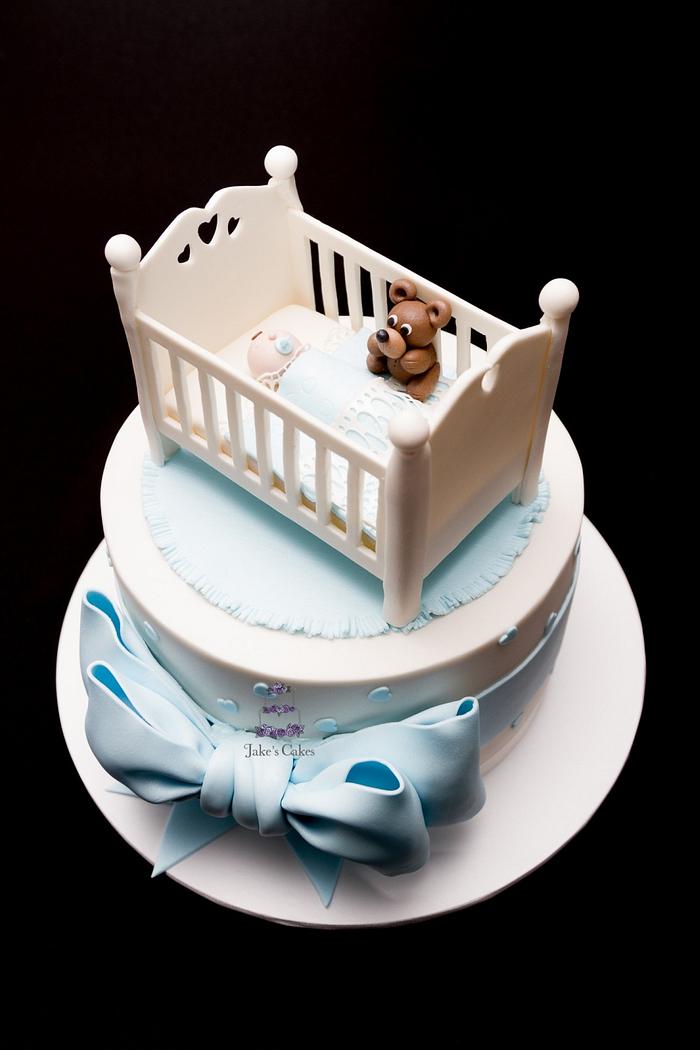 Baby cot baby shower cake