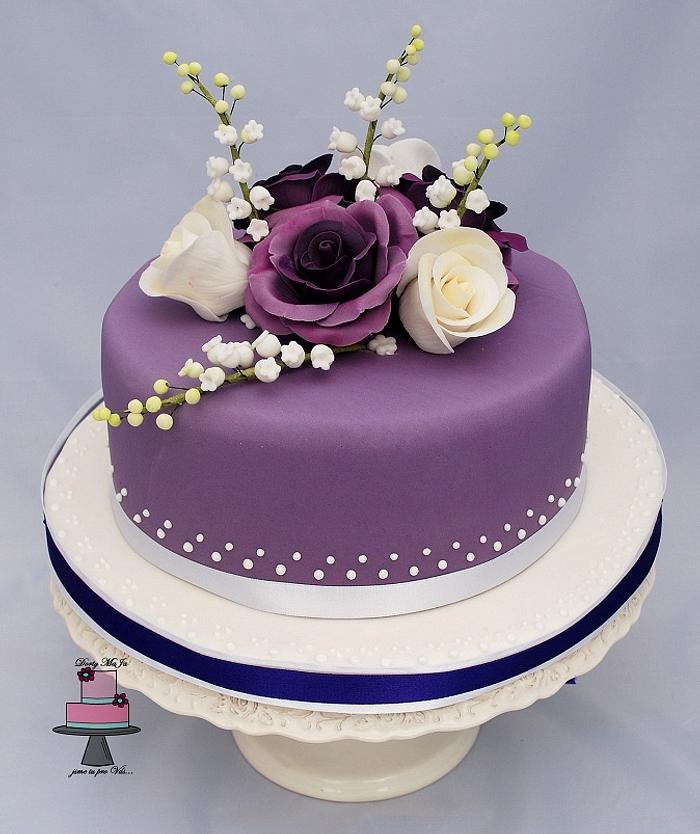 cake with violet decoration Stock Photo - Alamy