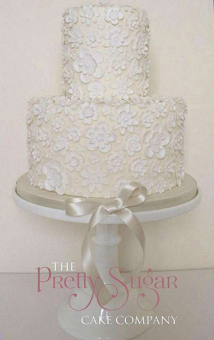 Pretty floral lace wedding cake