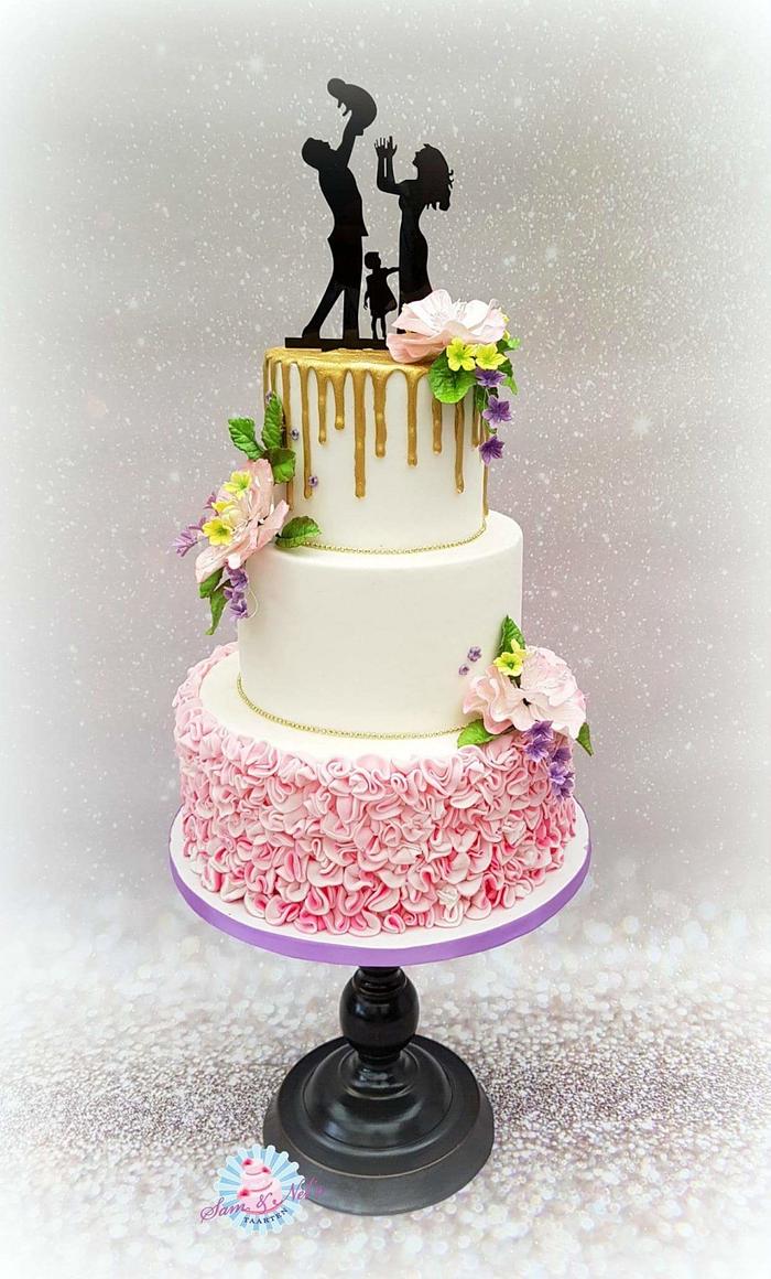 Pink wedding cake with ruffels