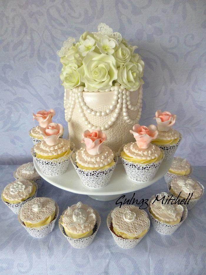 Vintage wedding cake and cupcakes