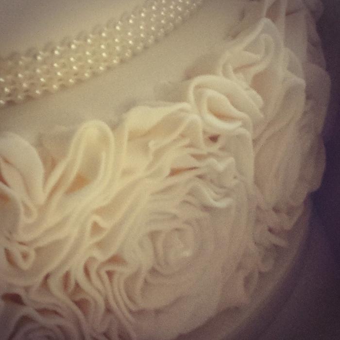Ruffle and jewel wedding cake
