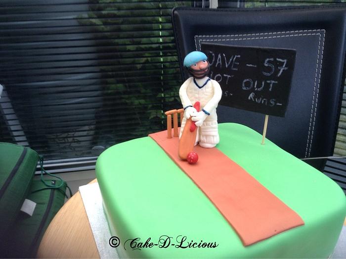 Cricket player cake