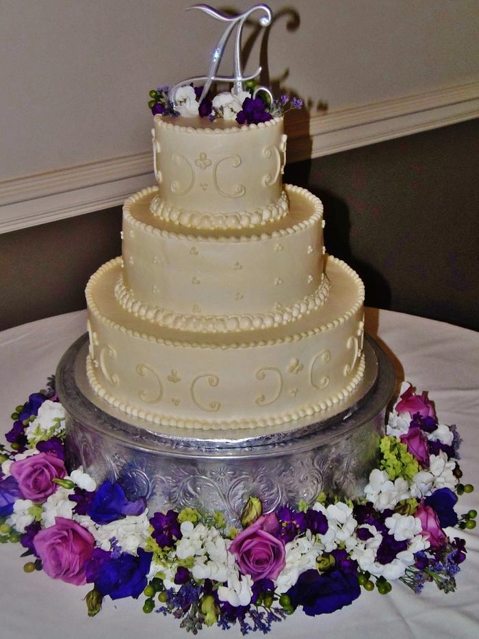 Buttercream wedding scrollwork cake