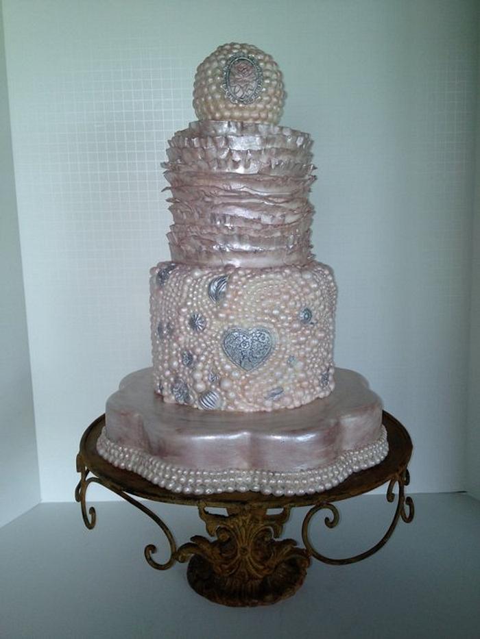 Blush pink and ivory Pearls and ruffles cake