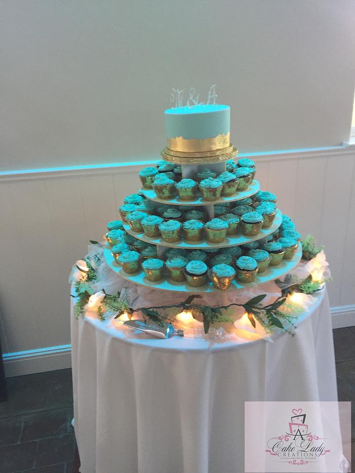 Ededible gold leaf and teal wedding cake
