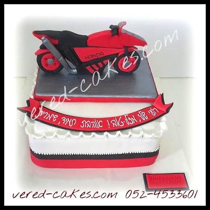 A red motorcycle cake