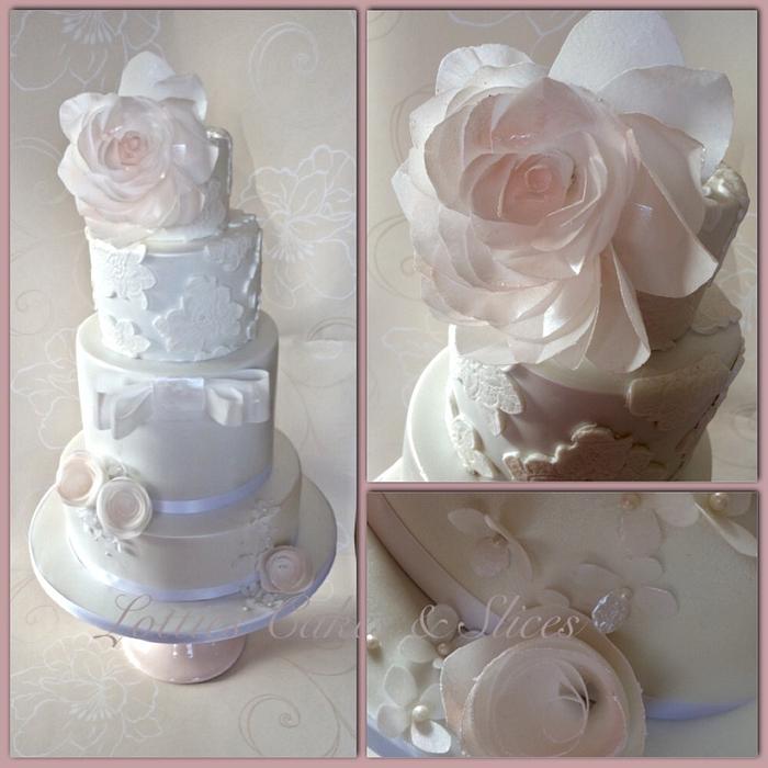 Lace Satin Wedding Cake  with Wafer paper flowers. 
