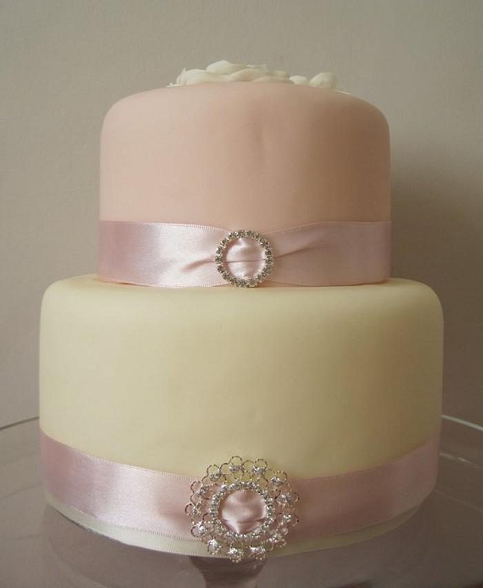 Pink and ivory celebration cake