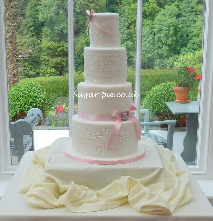 Pink Brooch & damask wedding cake