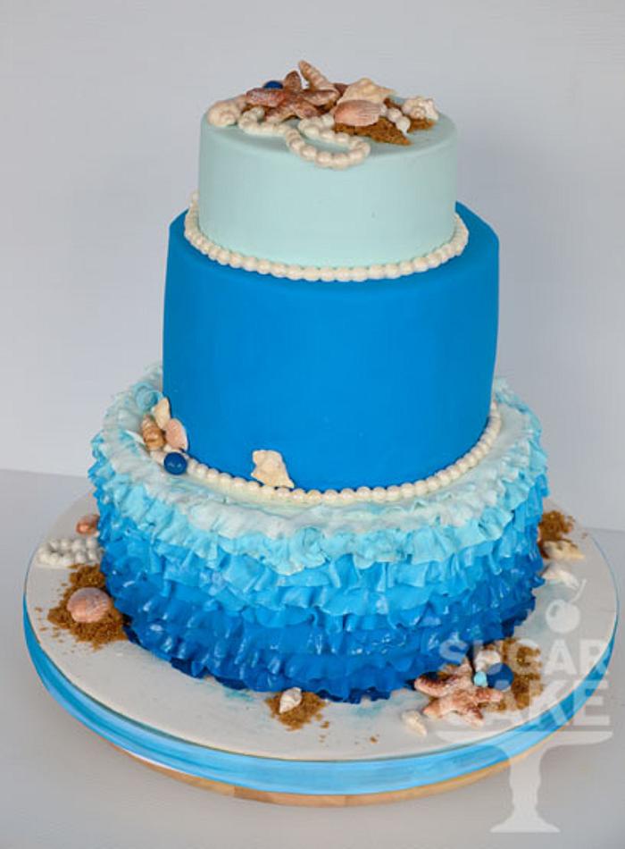 Blue beach wedding cake