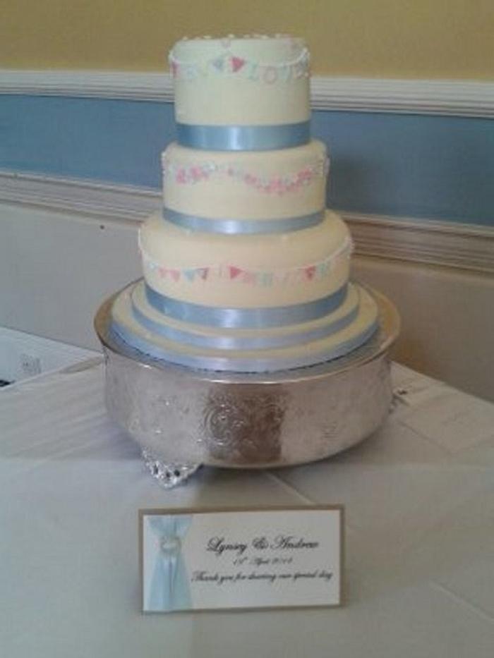 3 tier stacked vintage bunting wedding cake