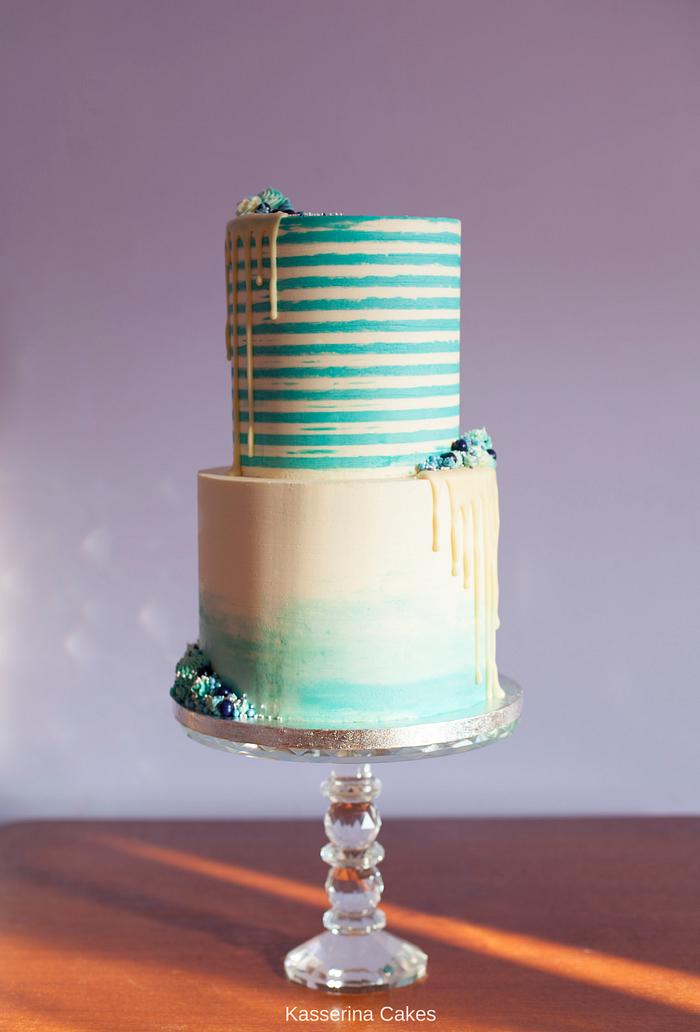 Rustic aqua-blue stripes and watercolour ombré drip cake
