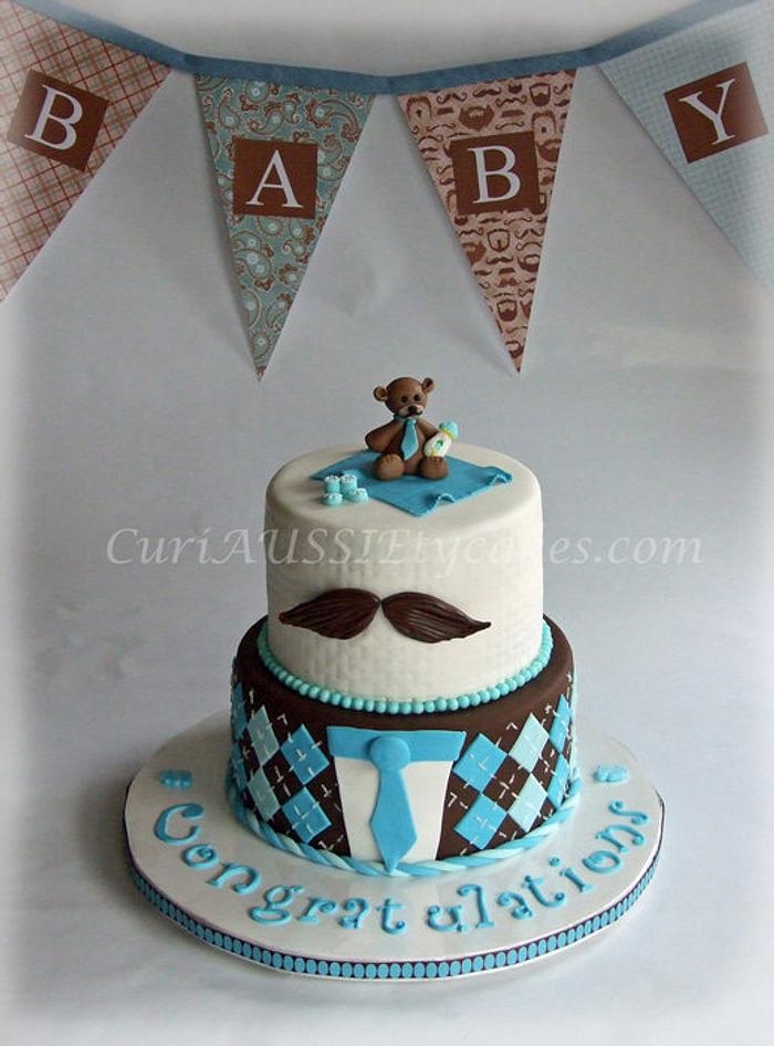 Mustache theme baby shower cake