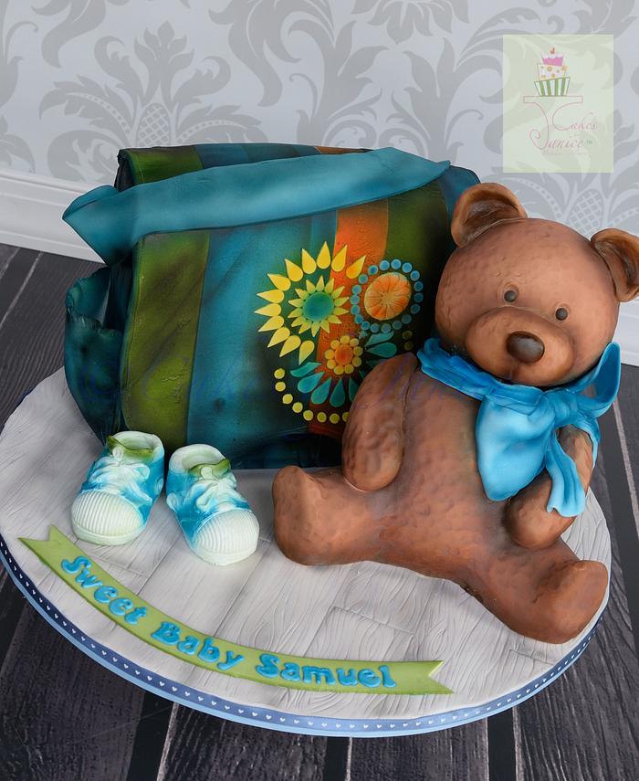 Baby shower diaper bag cake and teddy bear