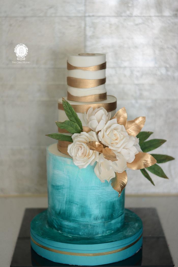 Teal White an Gold Cake