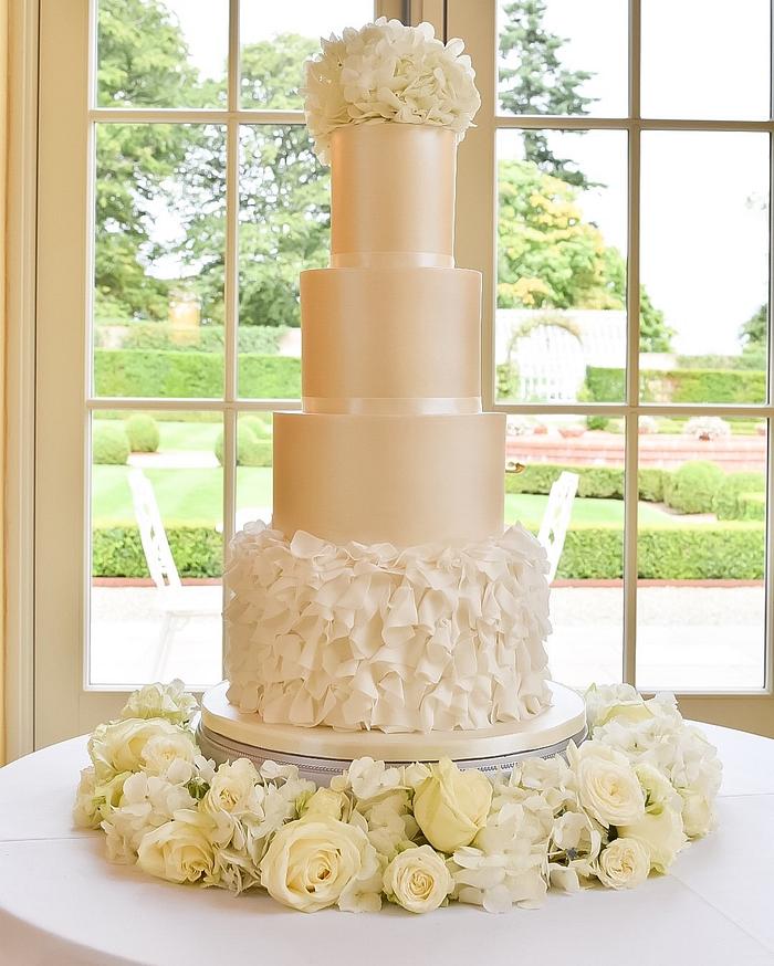 Ruffles and shimmer wedding cake 
