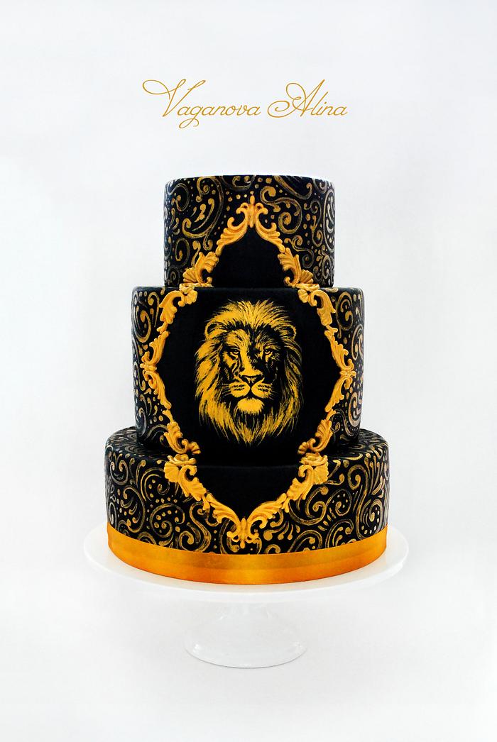 gold and black cake with lion