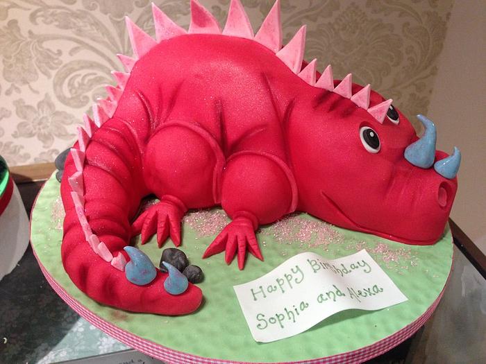 Pink sparkly dinosaur cake