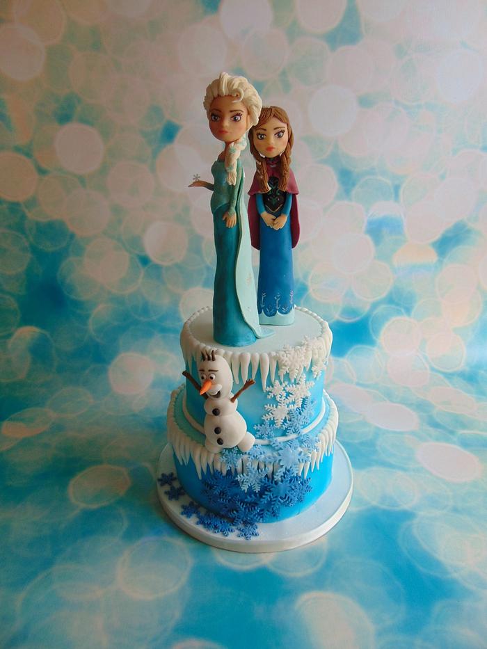 Frozen cake with modelling chocolate figures