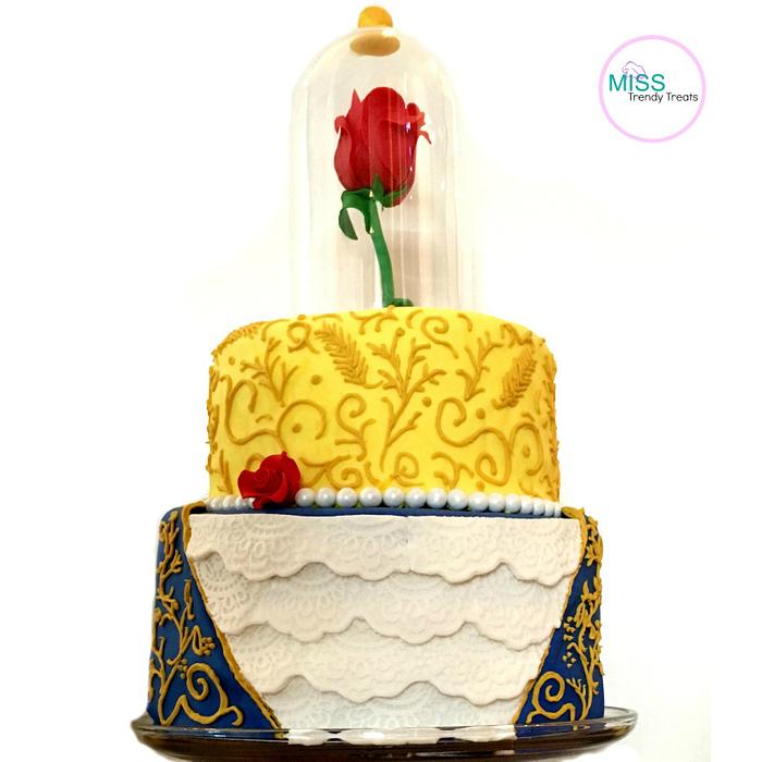BEAUTY AND THE BEAST CAKE WITH EDIBLE ROSE POP!