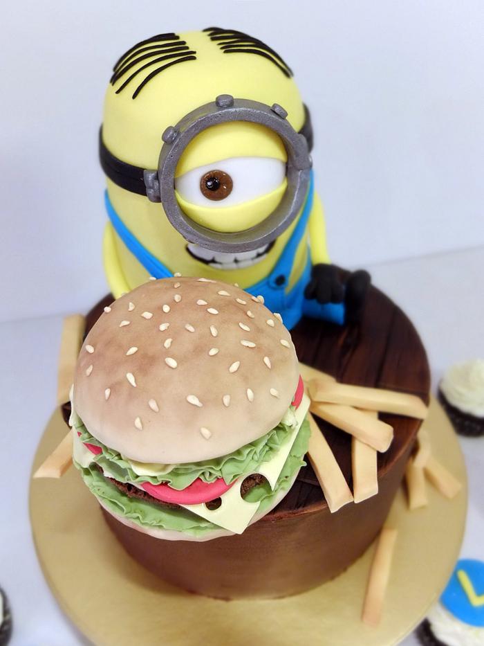 Minion with burger and cupcakes.