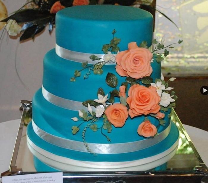 Coral rose wedding cake