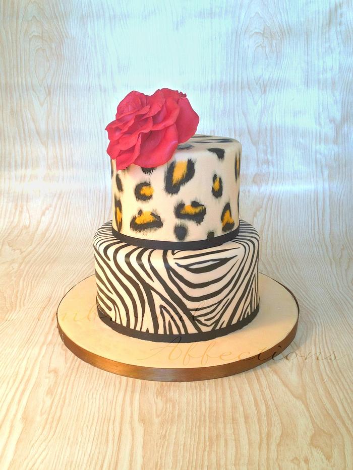 Creative sweet cake decorated with leopard print and black and yellow  details Stock Photo - Alamy