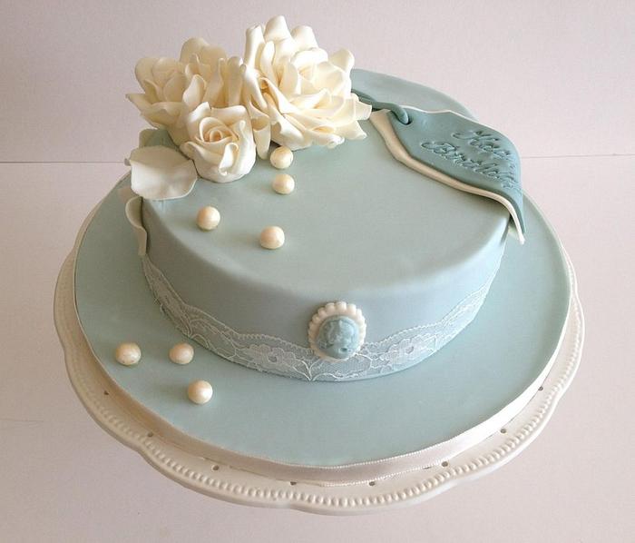 Birthday cake in duck egg blue and ivory