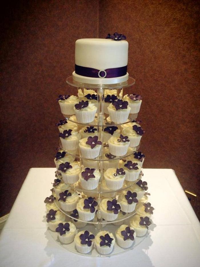 Purple flower wedding cupcake tower