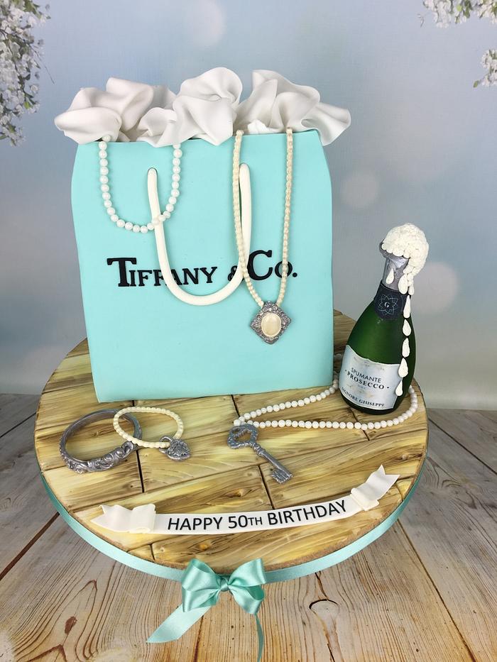 Tiffany bag cake with mini  prosecco bottle 