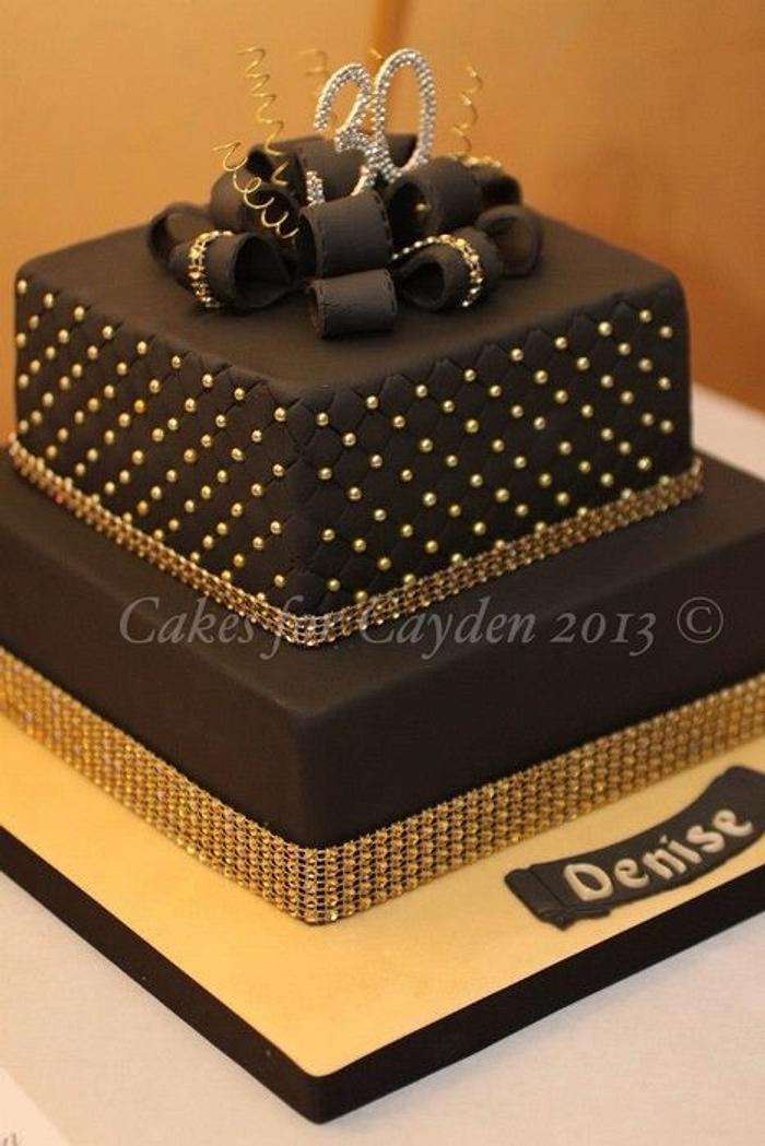Black and gold parcel cake