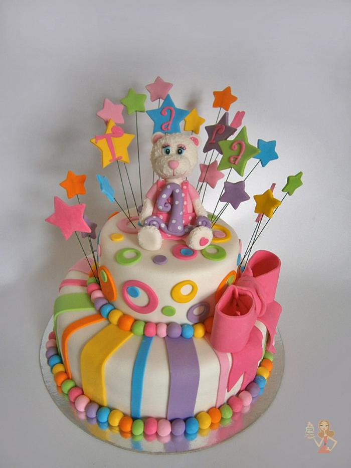 Colorful first birthday cake