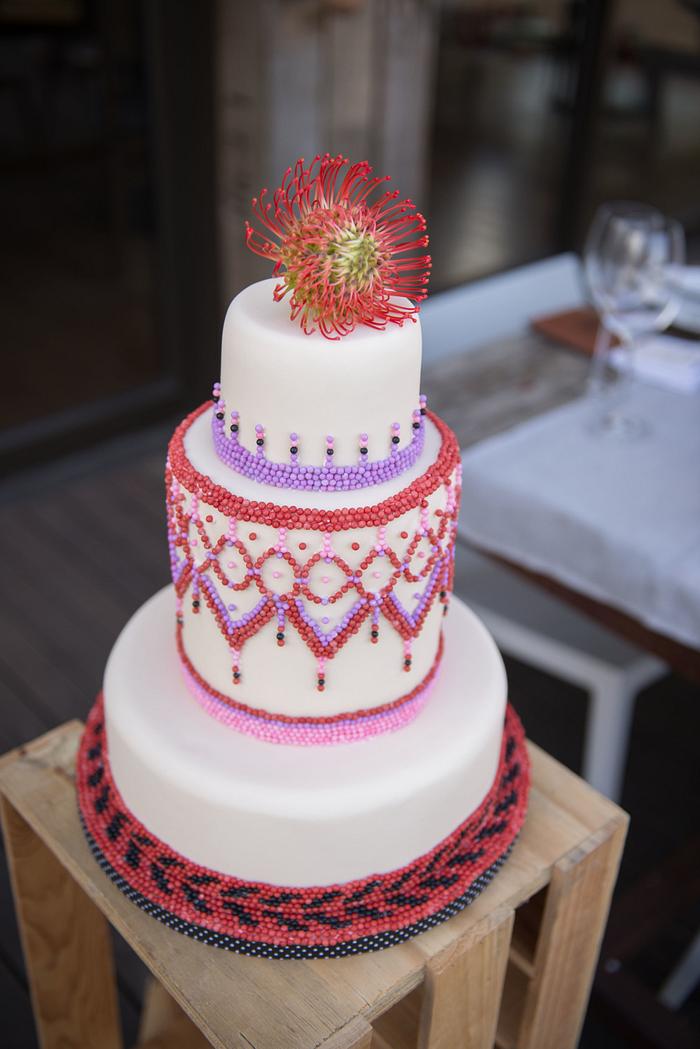 African beaded necklace wedding cake