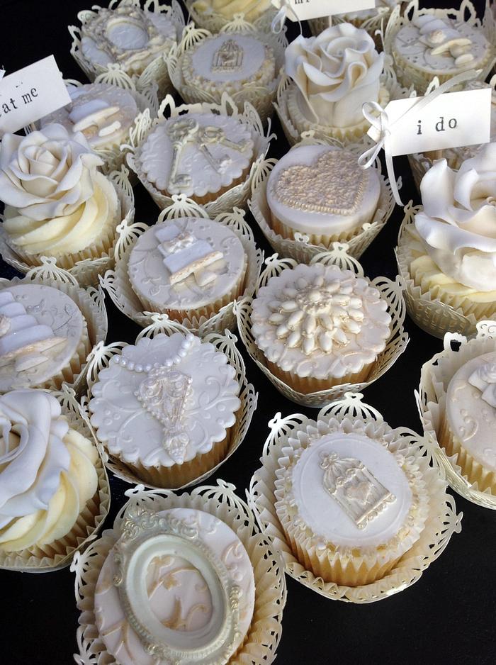 Ivory and gold wedding cupcakes 