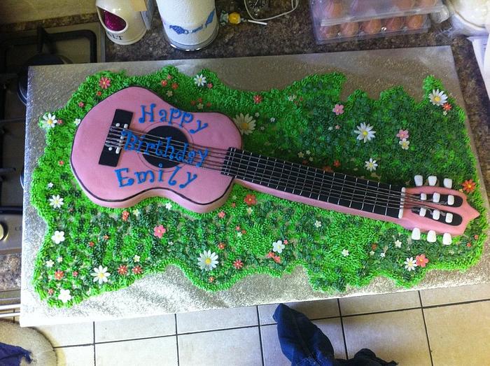 Pink guitar.