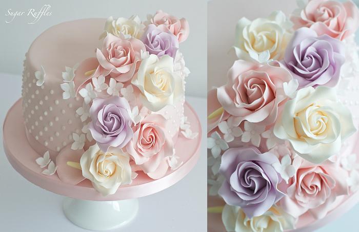 Birthday cake with cascading sugar flowers