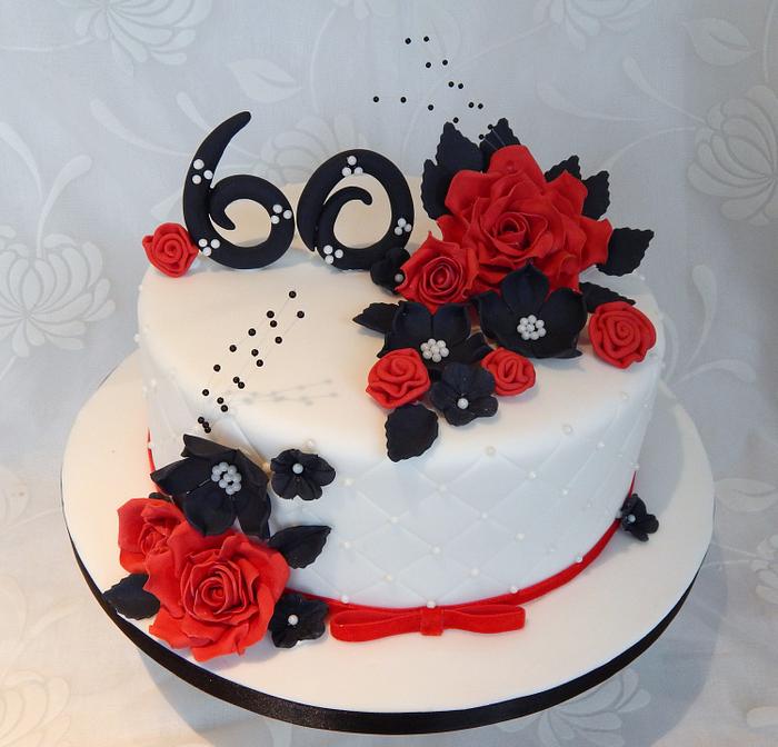 Black cake with red roses - Decorated Cake by House of - CakesDecor