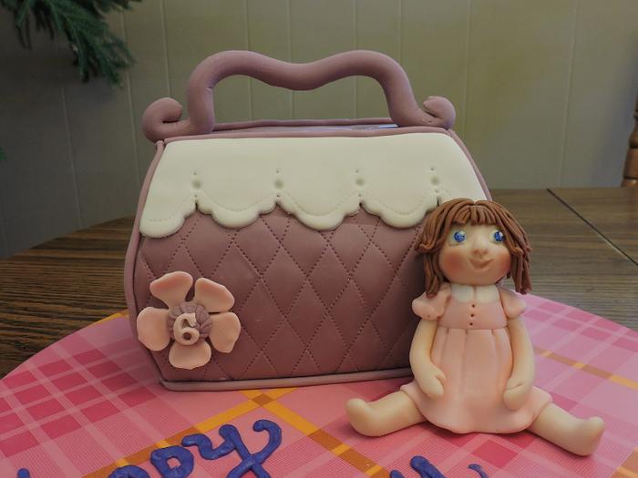 Pocketbook and Doll